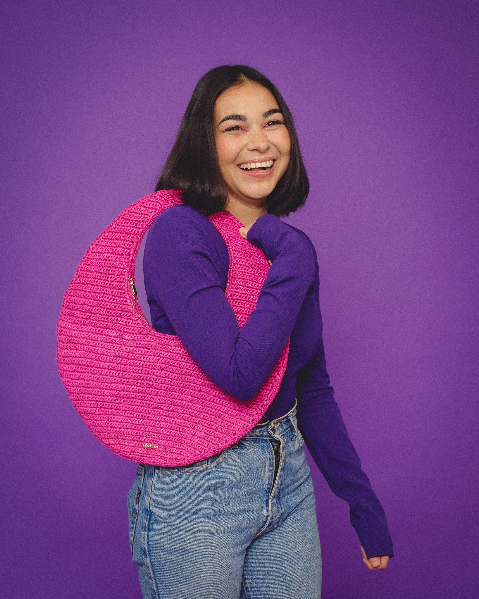 sac rond éthique en raphia – coloris rose – fait main à Madagascar